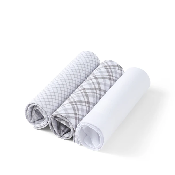 Three gray cotton handkerchiefs rolled up showing patterns